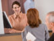 image of bank teller and customer